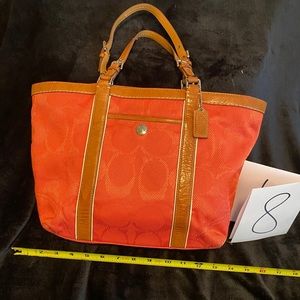Burnt orange canvas and tan leather tote